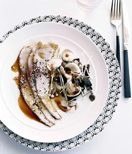 Seared kingfish with mushrooms, black fungi, pickled ginger and sesame dressing