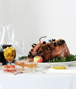 Roast suckling pig with walnut and apple stuffing