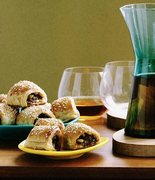 Lamb and harissa sausage rolls | Gourmet Traveller