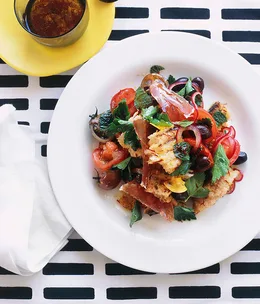 Tomato, jamón and soused Spanish onion salad with saffron vinaigrette