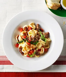 Orecchiette with sausage, rocket and tomato