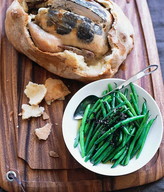 Salt-baked truffled chicken with warm green bean and truffle salad