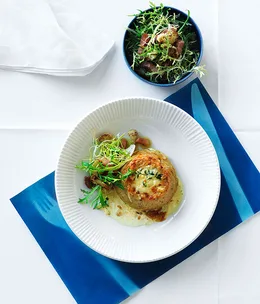 Double-baked cauliflower and Gruyère soufflé with frisée and lardon salad