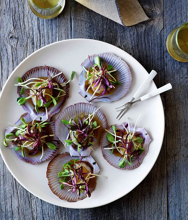 Scallops with citrus dressing and sprouts