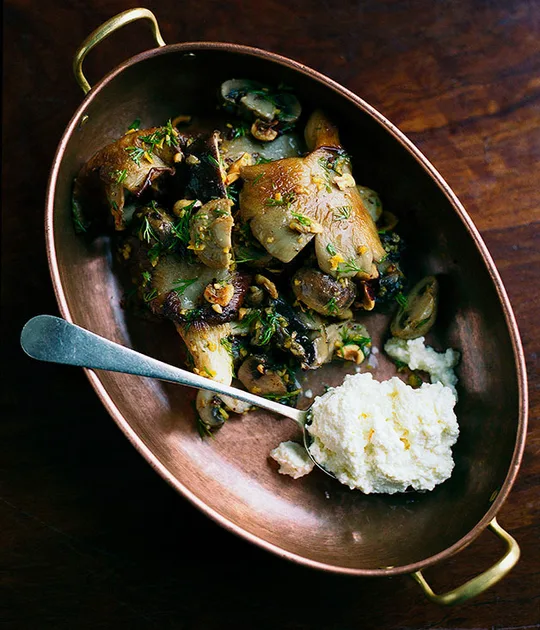 Mushrooms Sauteed In Hazelnut And Garlic Butter With Ricotta