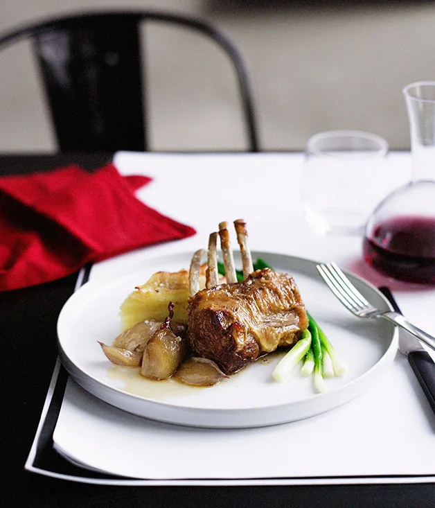 Braised lamb rack with Roquefort potato gratin and baby leeks