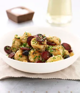 Crushed potato with chorizo, olives and preserved lemon