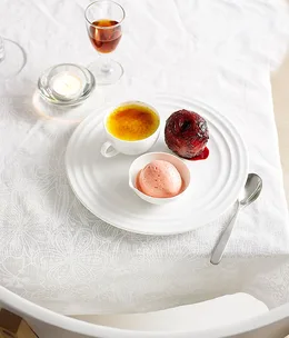 Muscat crème brûlée with poached plums and plum sorbet