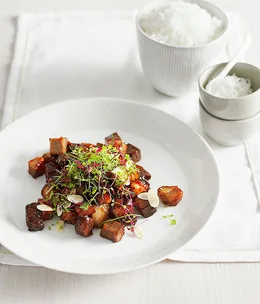 Crisp pork hock with roasted almond and chilli salad