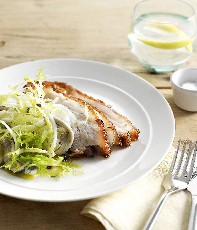 Crisp pork belly with fennel and white anchovy salad