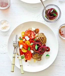 Sirloin steaks with tomato, ricotta and quick onion pickle