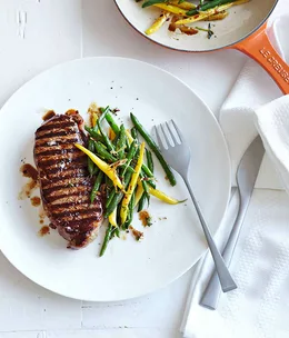 Char-grilled sirloin with caramelised beans and shallot