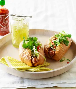 Pork hot dogs with pickled green papaya
