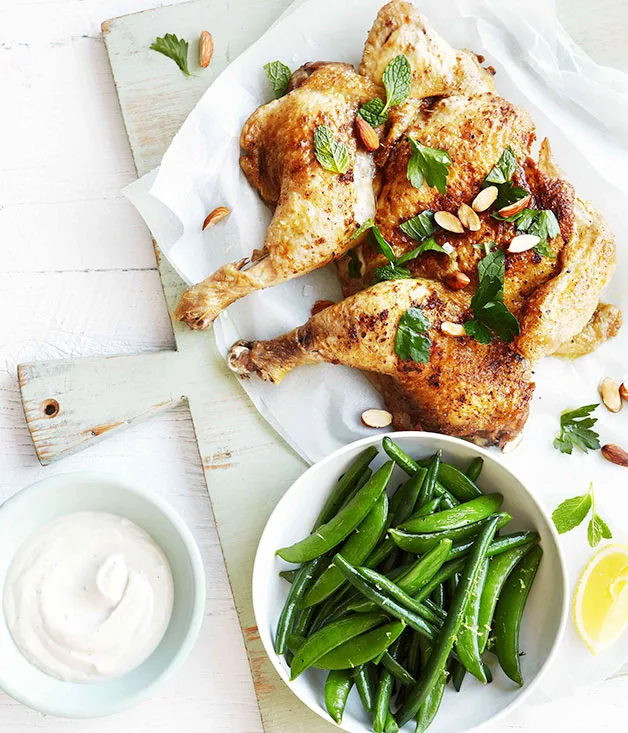 Roast chicken with yoghurt tahini dressing, lemon and mint