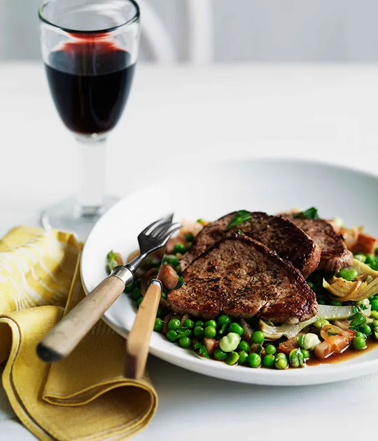 Pepper minute steaks with vignarola | Gourmet Traveller
