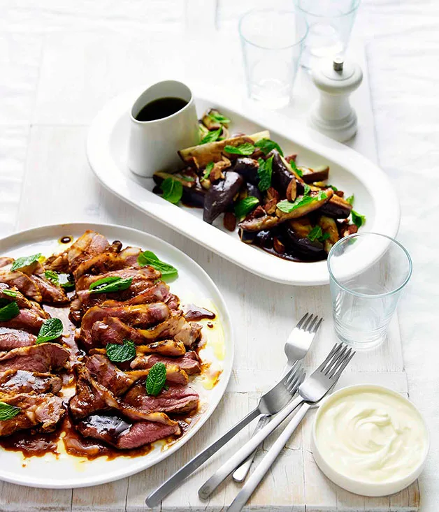 Sweet and sour eggplant with roast almonds and spice-rubbed lamb