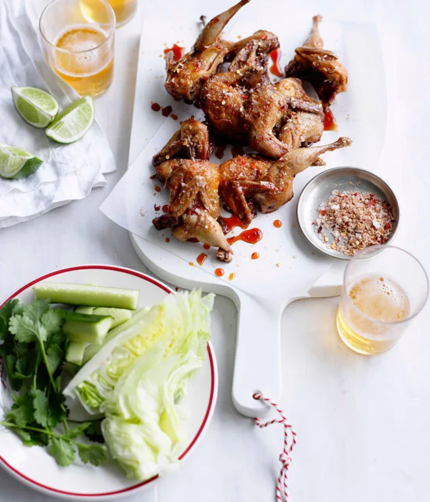 Fried quail with cucumber and lettuce wedges