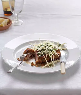 Crumbed veal cutlet with lemon and celeriac (costoletta con sedano rapa)