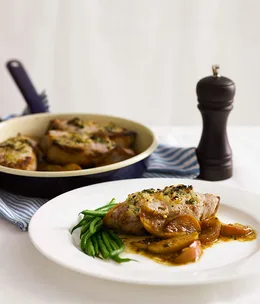 Roast pork chops with apples, onion and sage