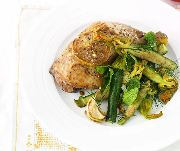 Roast lemon chicken with warm zucchini flower salad