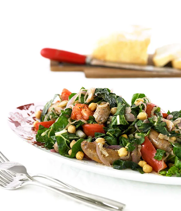 Spicy chipolatas with silverbeet and chickpeas