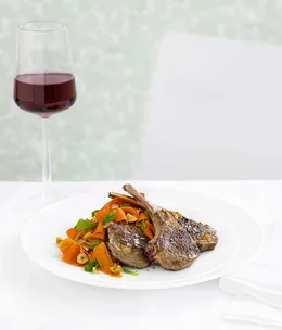 Lamb cutlets with spiced carrot and hazelnut salad