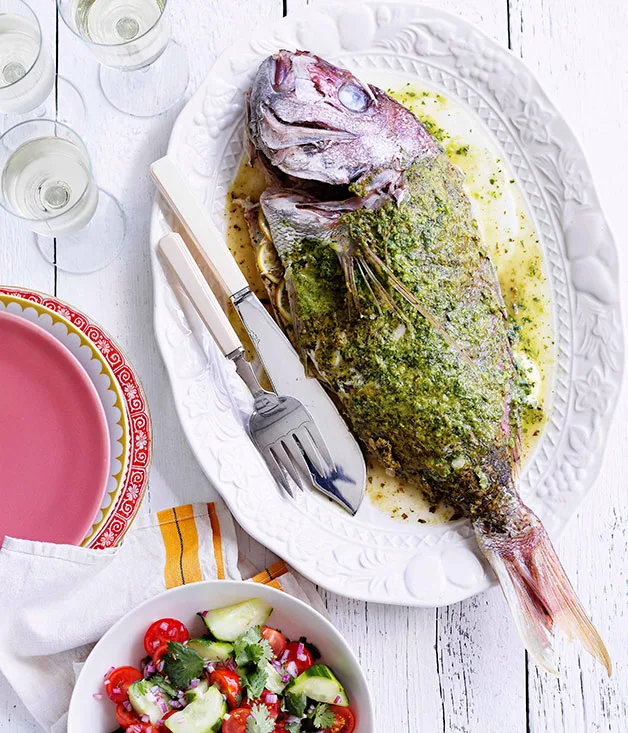 Spiced whole snapper with tomato and cucumber salad