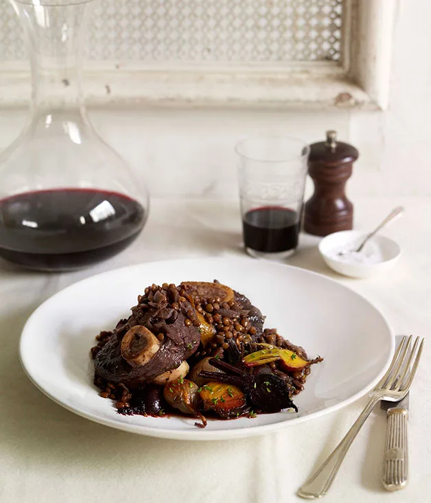 Pot-roasted venison with lentils, roast beetroot and shallots