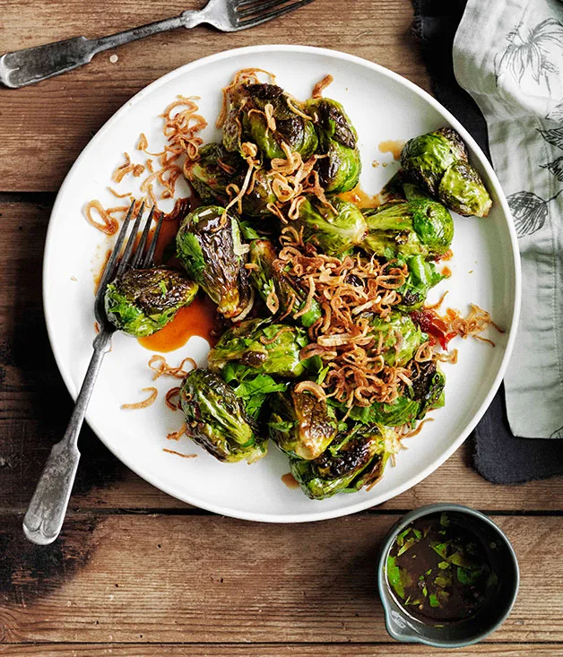 Roasted Brussels sprouts with crisp shallots and sweet, sour and salty dressing