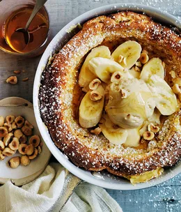 Puffed pancake with honey-malt ice-cream and bananas
