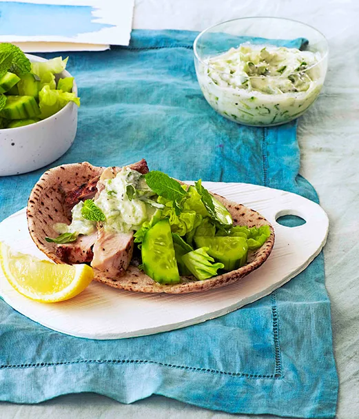 Barbecued oregano chicken with tzatziki and warm pita bread