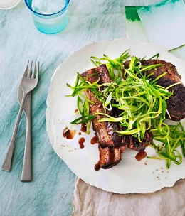 Sticky master-stock beef ribs with cucumber-sesame relish