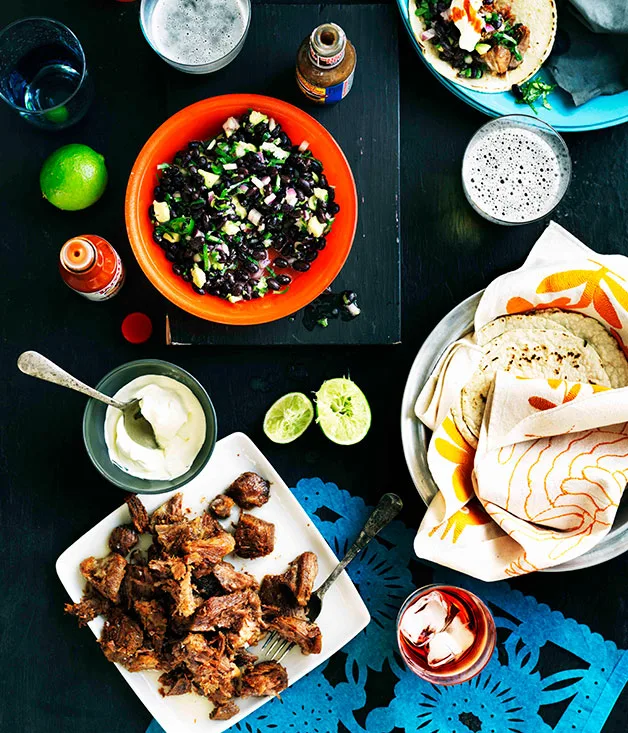 Carnitas tacos with black bean salad