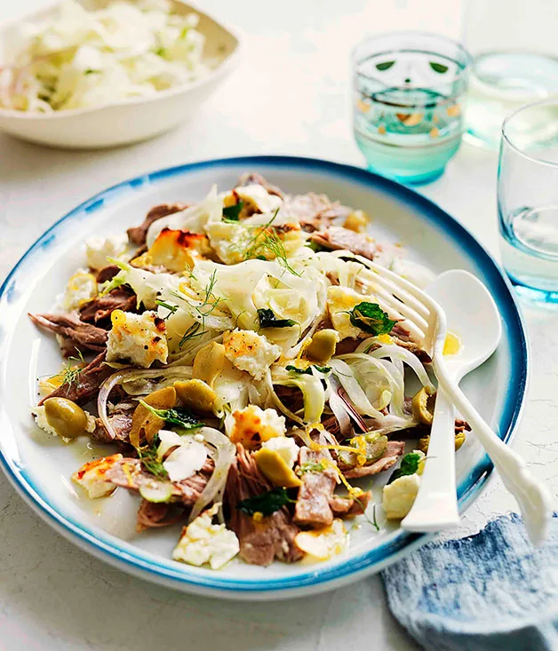 Slow-roasted lamb shoulder with baked ricotta and green olives