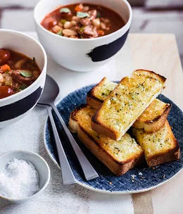 Bean, chorizo and tomato soup with Manchego soldiers