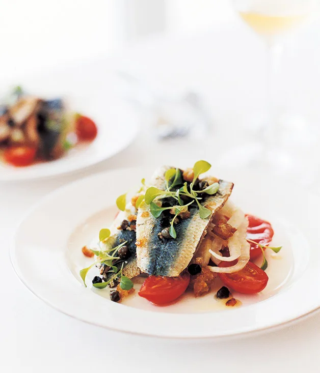 Pan-fried sardines with breadcrumb salsa, heirloom tomatoes and shaved fennel