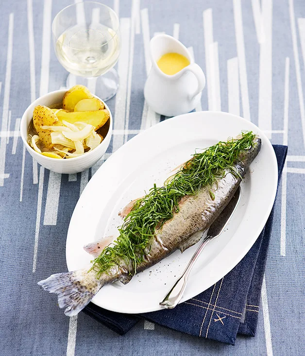 Poached rainbow trout with sorrel and lemon butter sauce