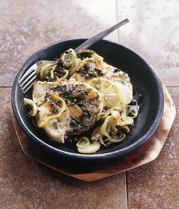 Baked swordfish with fennel, lemons and capers (Pesce spada al forno)