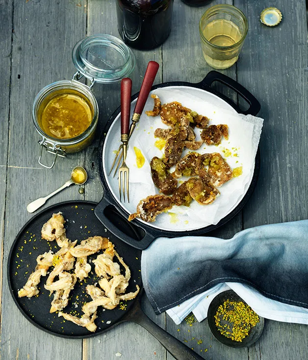 Fried sea urchin roe and clams with tomatillo salsa