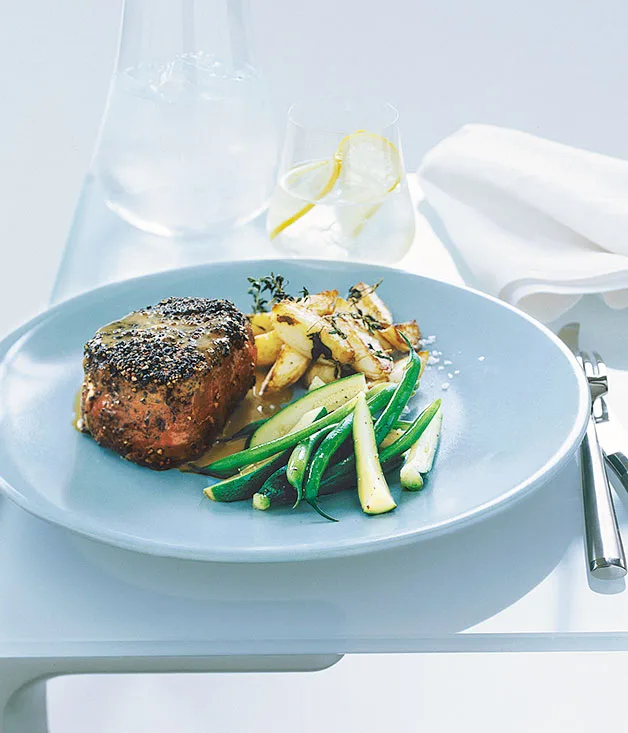 Steak au poivre with crisp potatoes