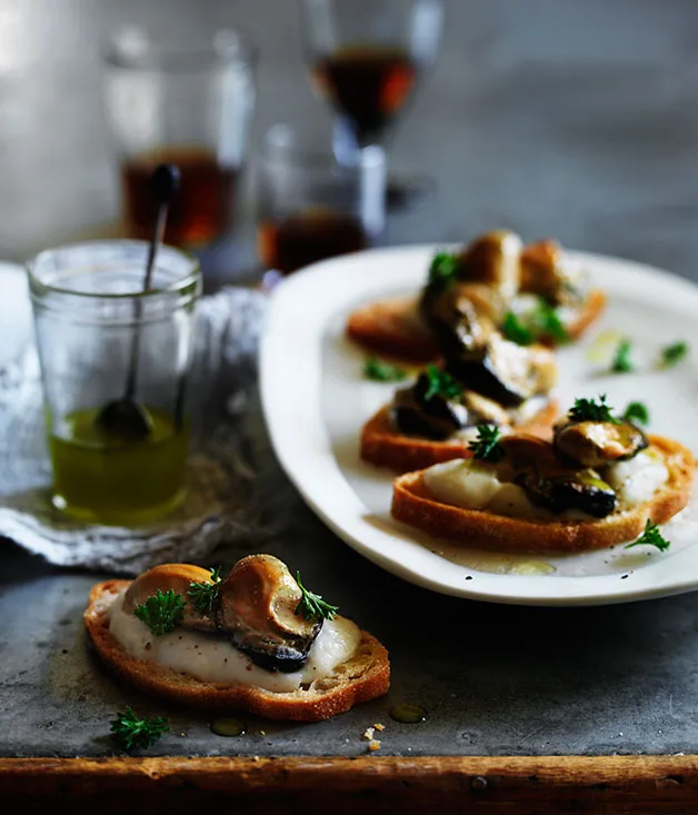 Smoked oyster crostini with cauliflower and fennel cream