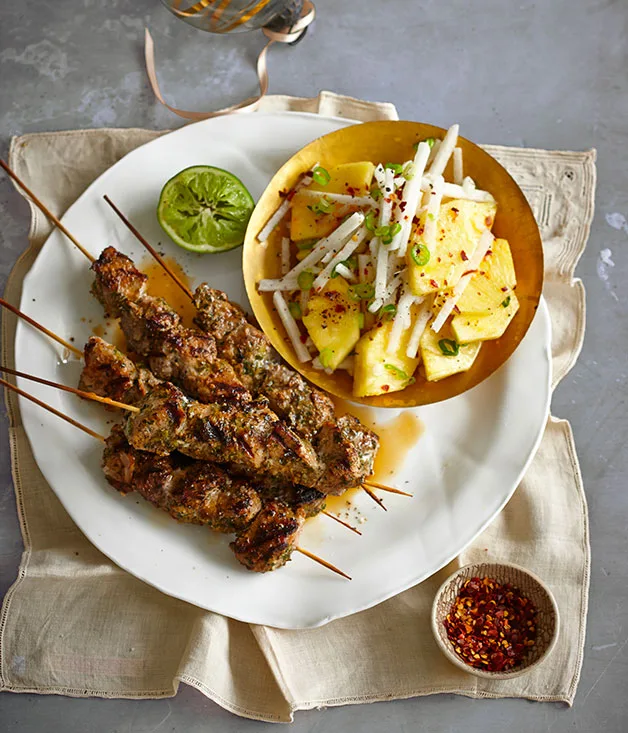 Jerk pork skewers with pineapple and jicama chopped salad