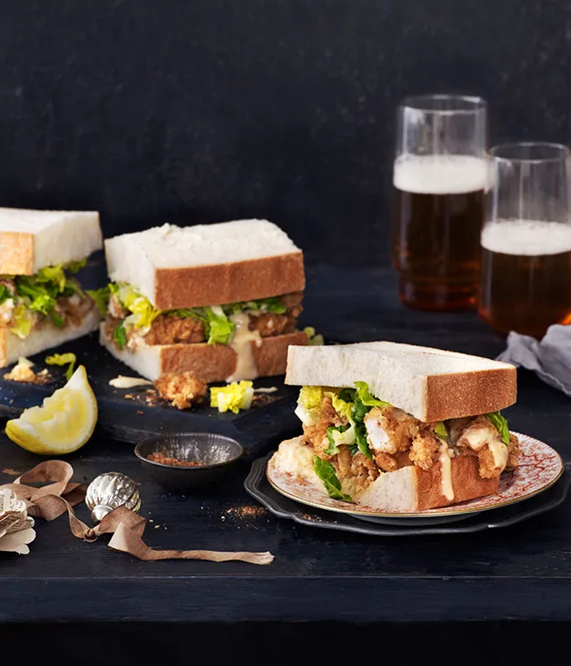Popcorn shrimp po’ boys with hot sauce