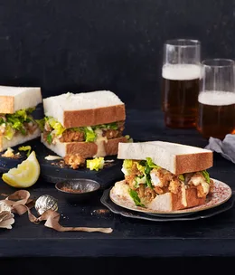 Popcorn shrimp po’ boys with hot sauce