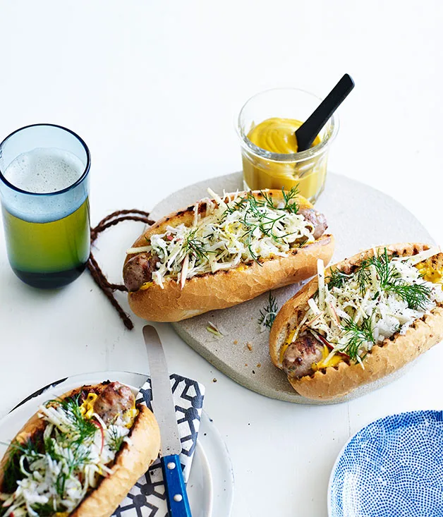 Pork sausages with caraway seed, cabbage and apple slaw