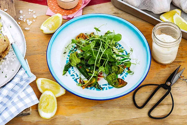 Sautéed zucchini flowers with lemon, chilli and garlic