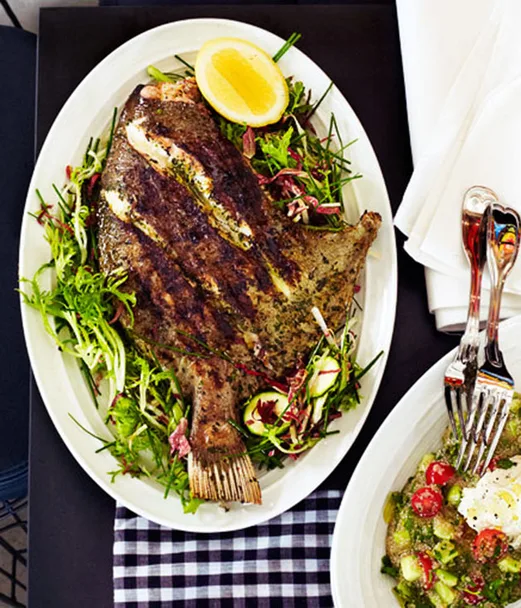 Grilled John Dory with zucchini and frisée salad
