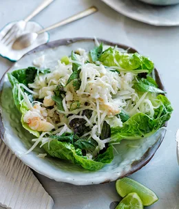 Spicy crab and green papaya salad on lettuce leaves