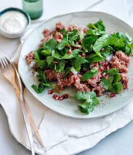 Lamb kibbeh nayeh with pomegranate and herb salad