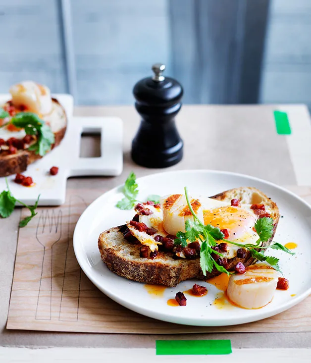 Scallops, chorizo and fried eggs on toast